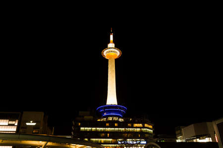 Kyoto, Japan - October 23, 2014: Kyoto tower with dark sky in Japan. The steel tower is the tallest structure in Kyoto with its spire at 131 metres (430 ft).のeditorial素材