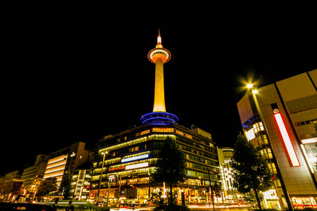 Kyoto, Japan - October 23, 2014: Kyoto tower with dark sky in Japan. The steel tower is the tallest structure in Kyoto with its spire at 131 metres (430 ft).のeditorial素材