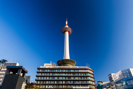 Kyoto, Japan - October 24, 2014: Kyoto tower with dark sky in Japan. The steel tower is the tallest structure in Kyoto with its spire at 131 metres (430 ft).のeditorial素材