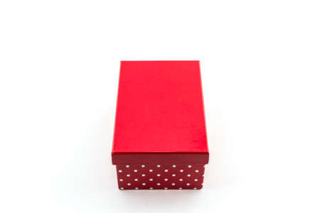 Red polka dots box on white background,with clipping path.の写真素材