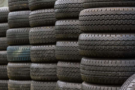 Stack of old wheel black tiresの写真素材
