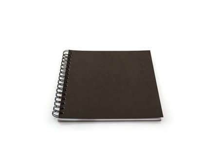 Close up black sketch book on white background.