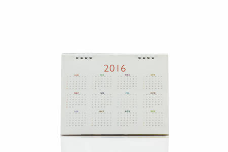 White paper desk spiral calendar 2016 on white background.の写真素材