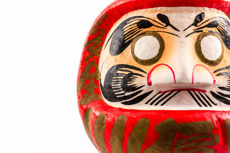 Darumas lucky doll on white background.の写真素材