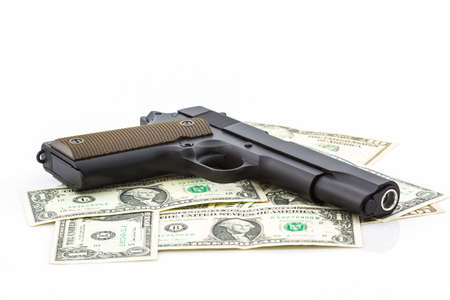 Money with Gun on white background.の写真素材