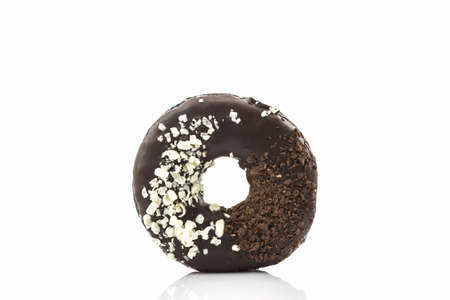 Chocolate donut with Sprinkles on white background.の写真素材