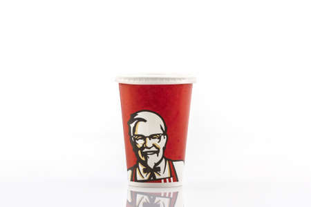 Bangkok, Thailand- February 6, 2015: Paper cups with  KFC logo, KFC U.S. chain of cafes, specializing in chicken dishes.のeditorial素材