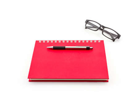 Close up Red diary book on white background.の写真素材