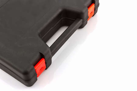 Black tool box, plastic case on white background.の写真素材
