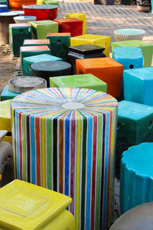 Close up row of ceramic chairs, handicraft, Thailand.の写真素材
