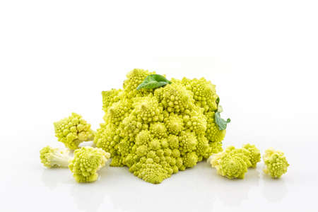 Fresh of green vegetable,Romanesco broccoli, Roman cauliflower on white background.の写真素材