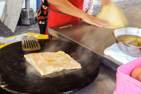 Fried flour with milk and sugar Roti Thai dessert style.の写真素材