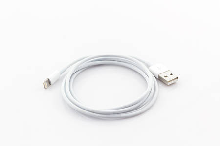 USB cable for smartphone on white background.の写真素材