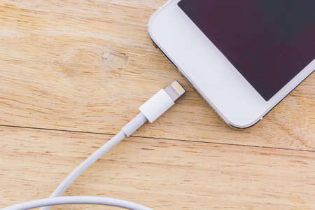 USB cable for smartphone on white background.