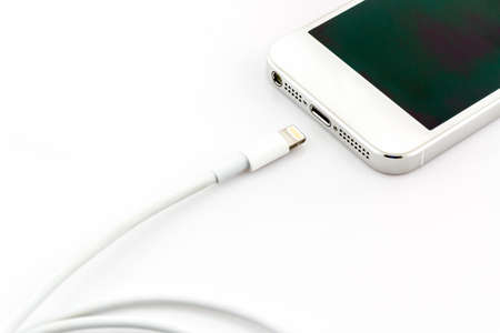 USB cable for smartphone on white background.