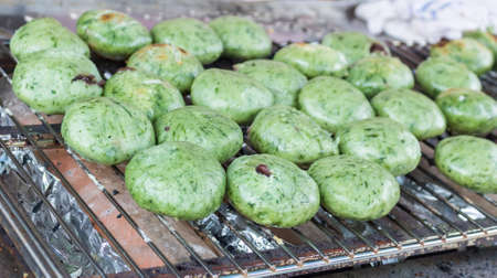 Roasted green tea steamed stuff bun on oven at oshino hakkai market, Japan.の写真素材