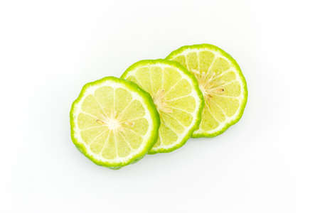 Slices Kaffir Lime (Bergamot) on white background.