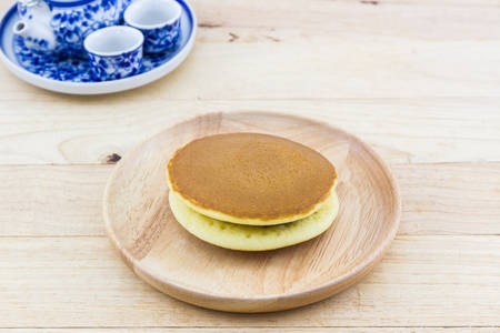 Dorayaki japanese snack, dorayaki is a japanese bread, japanese pancakes on wooden table.の写真素材