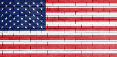 Flag of united states of america painted over on old brick wall.の写真素材