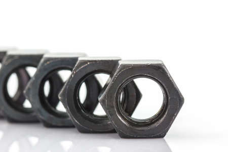 Close up Metal nuts on white background.