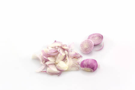 Red onion slices on white background.の写真素材