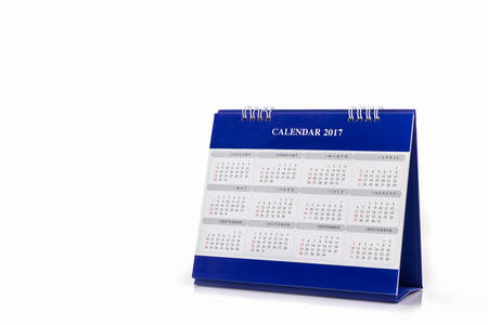 White paper desk spiral calendar 2017 on white background.の写真素材
