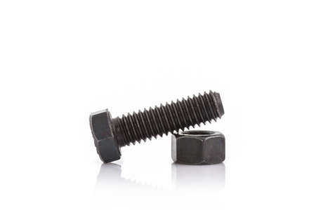 Closeup metal screw, bolt and nuts on white background.の写真素材