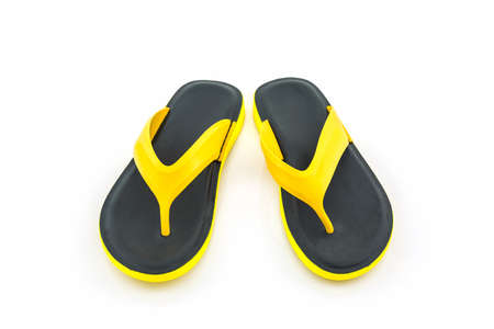 Colorful of Sandals shoes / Yellow and black flip flops on white background.