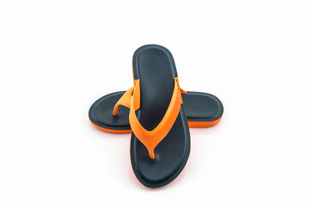 Colorful of Sandals shoes / Orange and black flip flops on white background.の写真素材