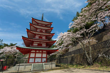 Tokyo, Japan - April 11, 2016: Chureito Pagoda in Arakura Sengen Shrine area is viewpoint of Mount Fuji in combination with cherry blossoms and autumn colors popular.のeditorial素材
