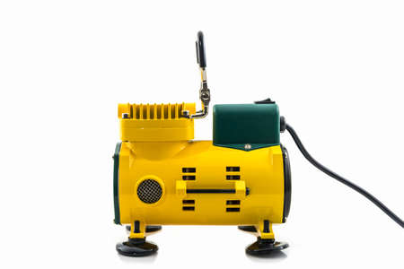 Mini air compressor on the white background.の写真素材