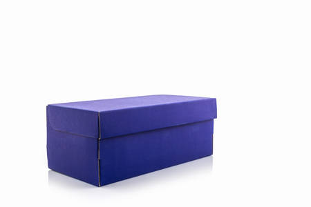 Blue shoe box with clipping path on white background. Paper box for shoes, electronic device and other products.の写真素材