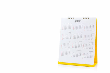 White paper desk spiral calendar 2017 on white background.の写真素材
