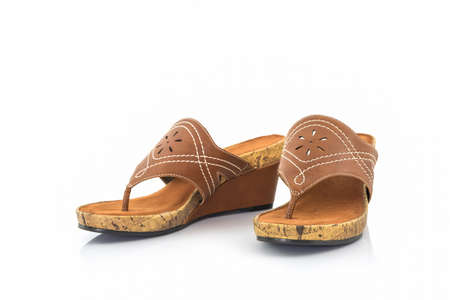 Brown womans shoes on white background.の写真素材