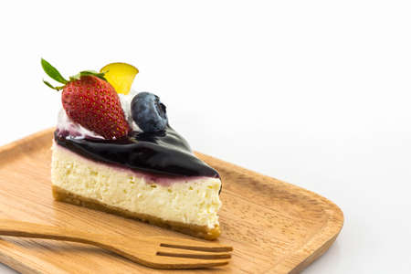 Blueberry cake slice on the white background.の写真素材