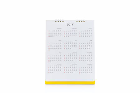 White paper desk spiral calendar 2017 on white background.の写真素材