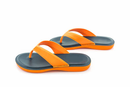 Colorful of Sandals shoes / Orange and black flip flops on white background.の写真素材