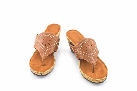 Brown womans shoes on white background.の写真素材