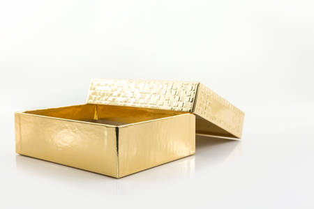 Gold color box on white background.の写真素材