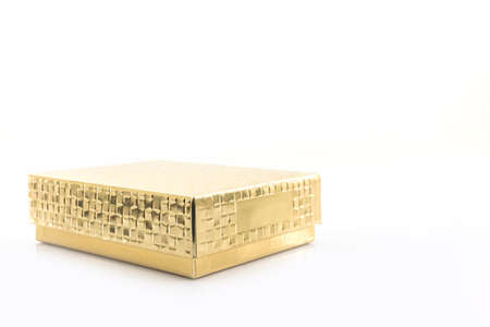 Gold color box on white background.の写真素材