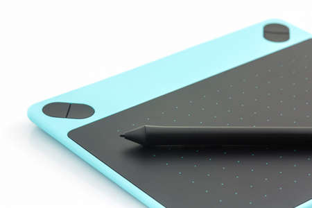 Digital graphic tablet and pen isolated on white background.の写真素材