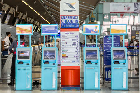 Bangkok, Thailand - May 25, 2017: A row of self service check-in counter at Suvarnabhumiairport airport in Bangkok, Thailand.のeditorial素材