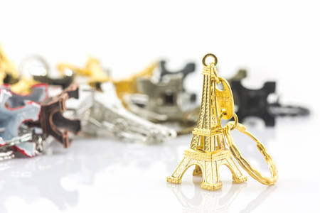 Souvenir key chain of mini eiffel tower (Tour Eiffel) white background.
の写真素材