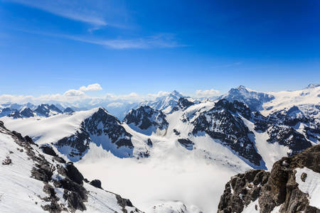 The snow mountain range mountain range from the Titlis is a mountain of the Uri Alps Engelberg, Switzerland.の写真素材