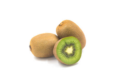 Ripe whole kiwi fruit and half kiwi fruit on white background.の写真素材