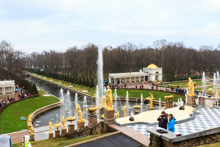 Saint Petersburg, Russia - May 2, 2018: Tourists visit The Peterhof Palace garden, St. Petersburg.のeditorial素材