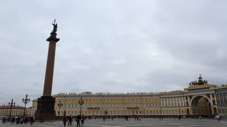 Tourists visit Palace Square with State Hermitage Museum and Winter Palace in Saint Perersburg, Russia.のeditorial素材