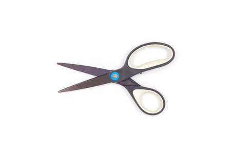 Single black steel scissors isolated on white background.の写真素材