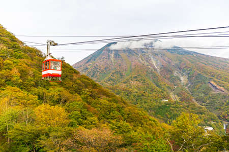 Nikko, Japan - October 16, 2018: Cable car and tourist at Akechidaira plateau in autumn at Akechidaira Ropeway Station, Nikko, Japan.のeditorial素材