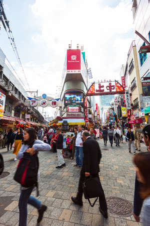 Tokyo, Japan - October 20, 2018: Tourists shopping at Ameyoko market in Tokyo Japan.It is a fresh market in the Taito Ward of Tokyo, Japan, located next to Ueno Station.のeditorial素材